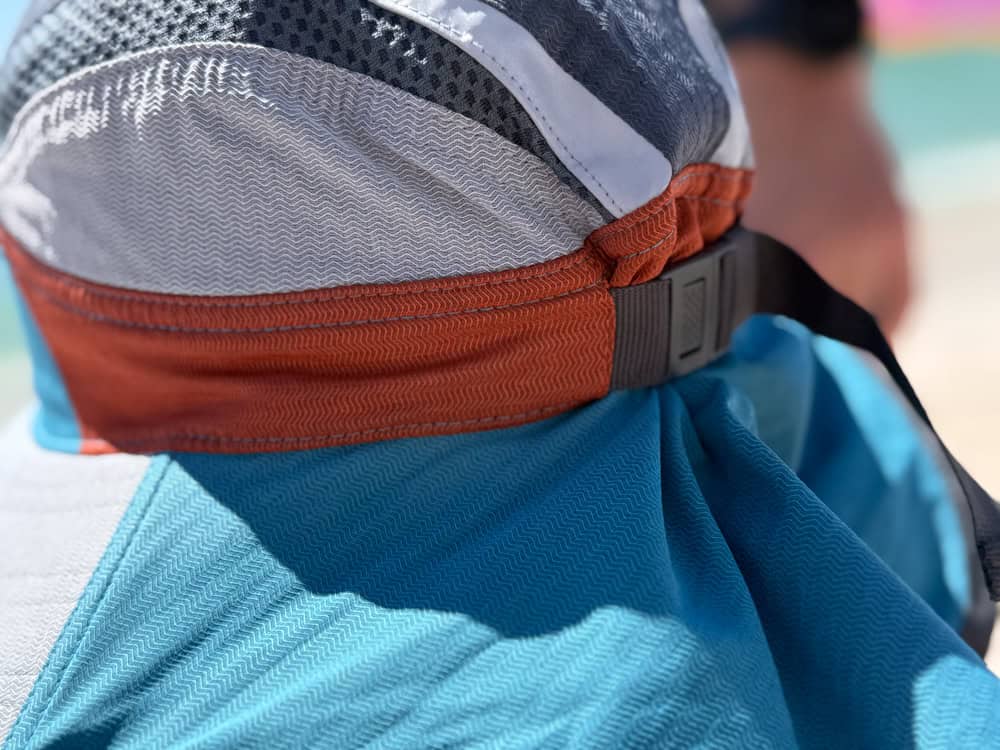 Close-up of sun protection hat with neck flap outdoors