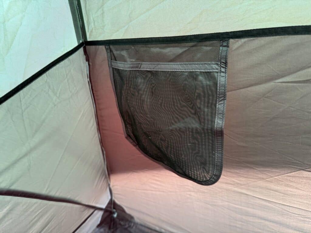 Mesh storage pocket on the inside wall of the Kelty Wireless 6