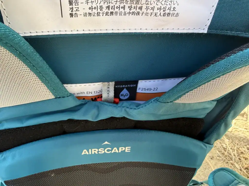 Zippered upper pocket on the Osprey Poco SLT child carrier