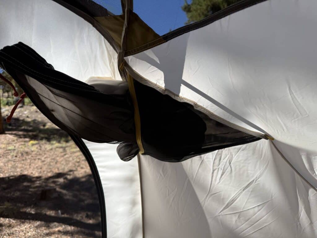 Close-up of a door panel tucked into its storage pocket on the REI Co-op Base Camp 6