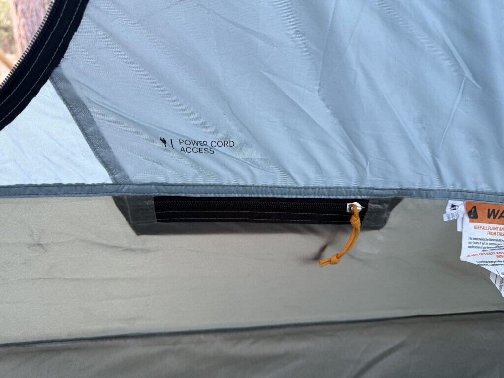 Power cord access port on the wall of the REI Co-op Westward 6