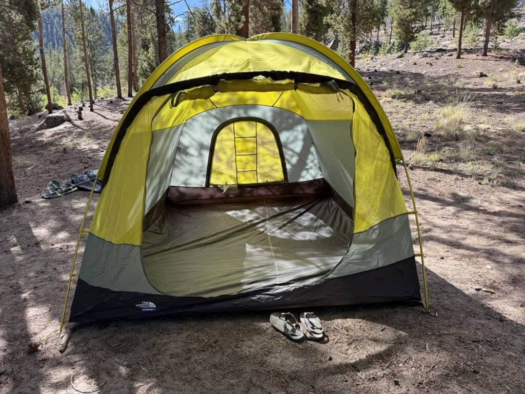 The North Face Wawona 6 tent body with the front door open, showing the floor and rear door